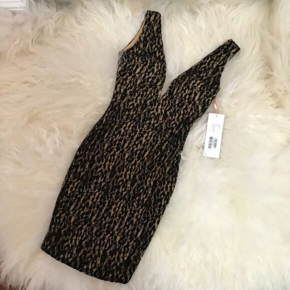 Jovani Dresses & Skirts - JOVANI BLACK/NUDE DRESS